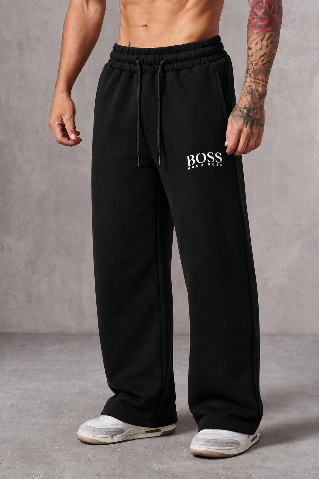 Printed Logo Wide-Leg Sweatpants in Black