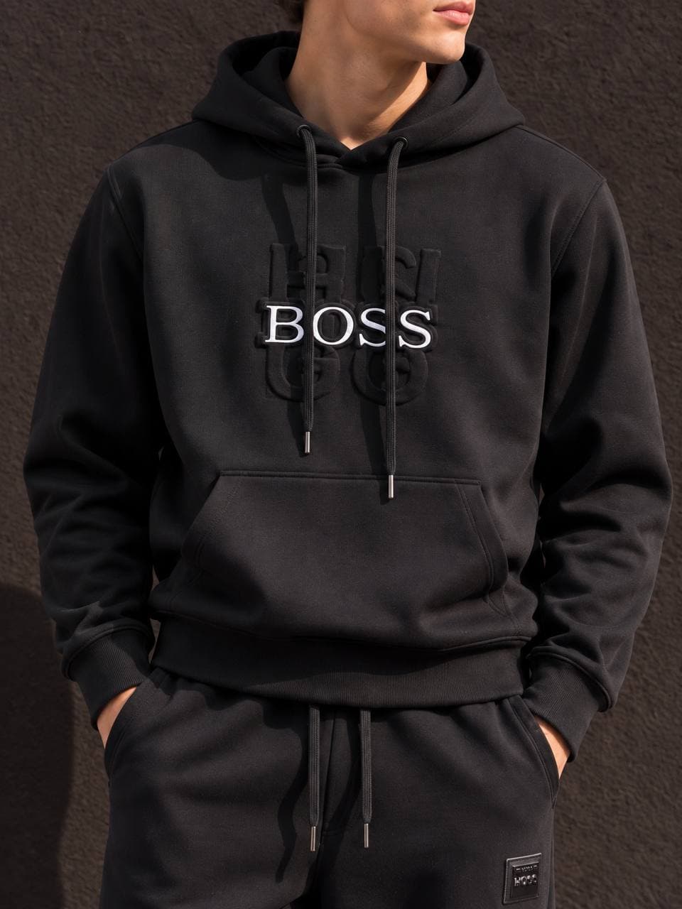 Embossed Monogram Hoodie in Black